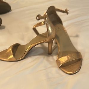 Gold strapped heels